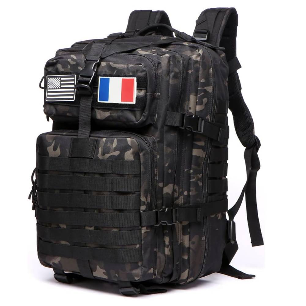 Camouflage tactical backpack with MOLLE straps and patches showing US and French flags, multiple compartments.