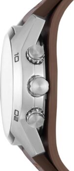 Close-up of a silver chronograph watch case with two pushers and a crown, brown leather strap visible on the right