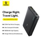 Baseus EnerFill FP21 power bank angled upright with textured black body, cyan LED indicators, and yellow logo area.