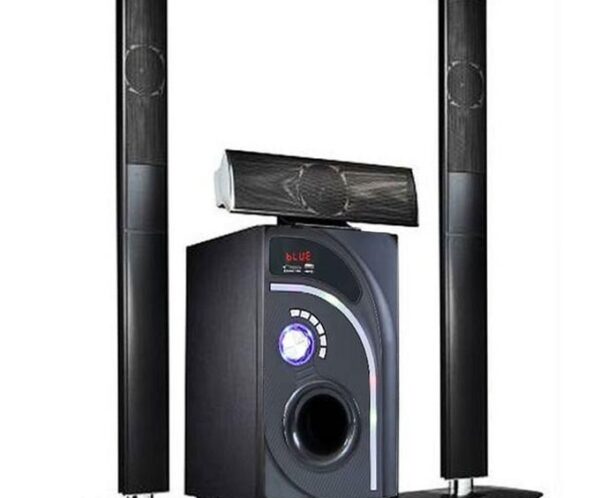 Black home theater speaker system with a subwoofer and two tall floor-standing speakers, plus a center-channel speaker perched on top.