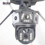 Close-up of a security camera with surrounding LED panels, branded Solar Master Lighting