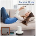 Relaxed woman lying on a sofa, holding a phone to control music wirelessly; foreground shows a wooden speaker and a cup of coffee, suggesting a home audio setup (advertisement for Receiver Model).