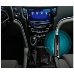 In-car Bluetooth dongle plugged into the center console, emitting blue wireless signals toward the car dashboard.
