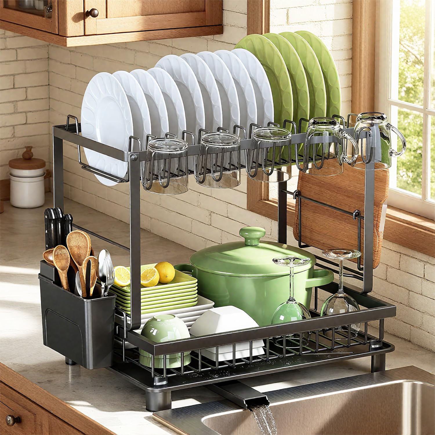 Dish drying rack with white and green plates, mugs, and glassware drying over a kitchen sink area.