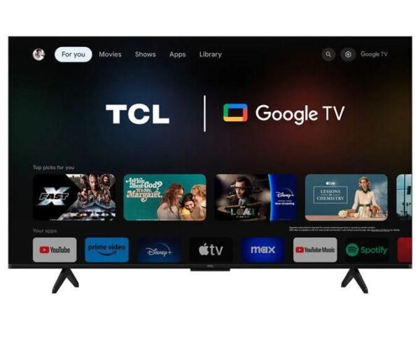 TCL TV displaying Google TV home screen with app row and logos on a dark background inside a living room setup