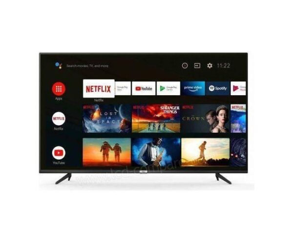 Flat-screen smart TV on a stand showing streaming apps and movie thumbnails.