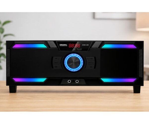 Black home audio speaker with a glowing blue circular dial and multicolor LED accents on a wooden table.