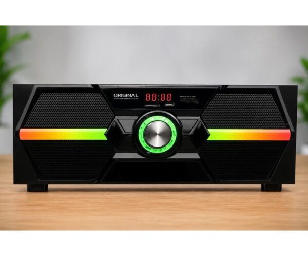 Black rectangular speaker/stereo with a central green LED dial and rainbow horizontal light strips on each side, placed on a wooden surface.