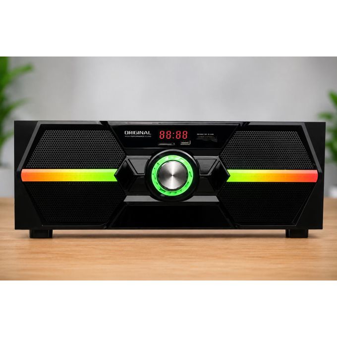 Black rectangular speaker/stereo with a central green LED dial and rainbow horizontal light strips on each side, placed on a wooden surface.