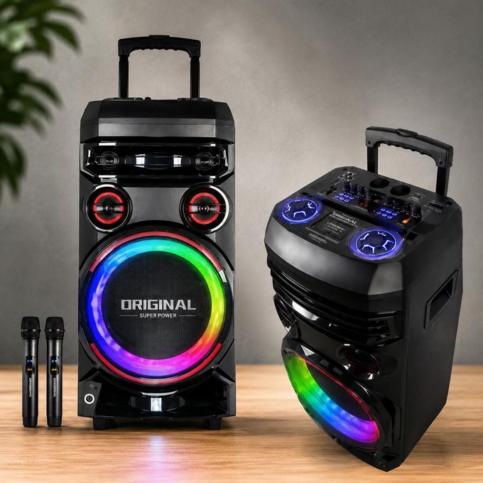 Two black party speakers with rainbow LED rings on the front, paired with two wireless microphones on a wooden floor for a karaoke setup.