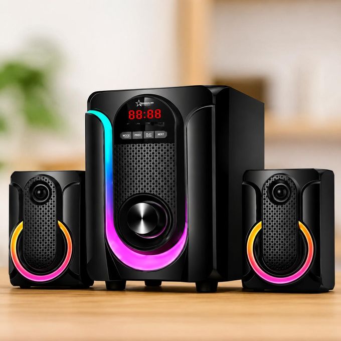 Black multimedia speaker system with a central subwoofer and two satellite speakers, each with colorful RGB ring lighting on a wooden table.