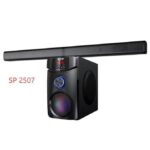 PC-style home audio speaker system with a long top bar and a standalone subwoofer; model SP 2507 visible on the unit.