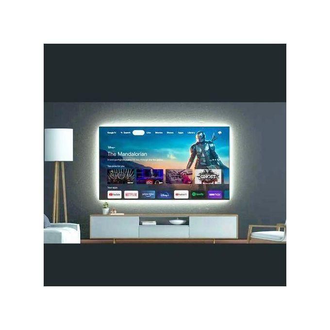TV mounted on a modern media console showing streaming content, including The Mandalorian, in a contemporary living room