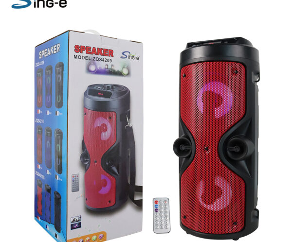 Portable red and black Bluetooth party speaker with LED ring lights, shown with remote and its packaging box
