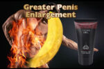 Promotional ad for Titan Gel penis enlargement showing a muscular man with a fiery ring and a tube labeled 'Titan Gel' on the right side.