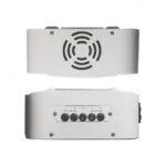 White metal electronic device with a circular vent on the top/front and a panel of input/output terminals on the back.