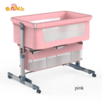 Pink baby bassinet on a height‑adjustable, wheeled stand with mesh sides for ventilation.