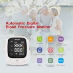 Front view of an automatic digital blood pressure monitor with a large LED display; background shows a smiling family and lifestyle icons.