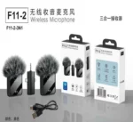 Dual wireless microphone system with two furry windscreen mics, USB cable, and product boxes labeled F11-2.