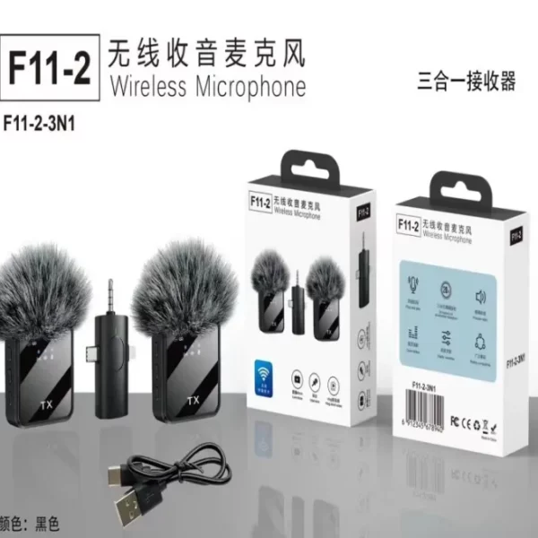 Dual wireless microphone system with two furry windscreen mics, USB cable, and product boxes labeled F11-2.