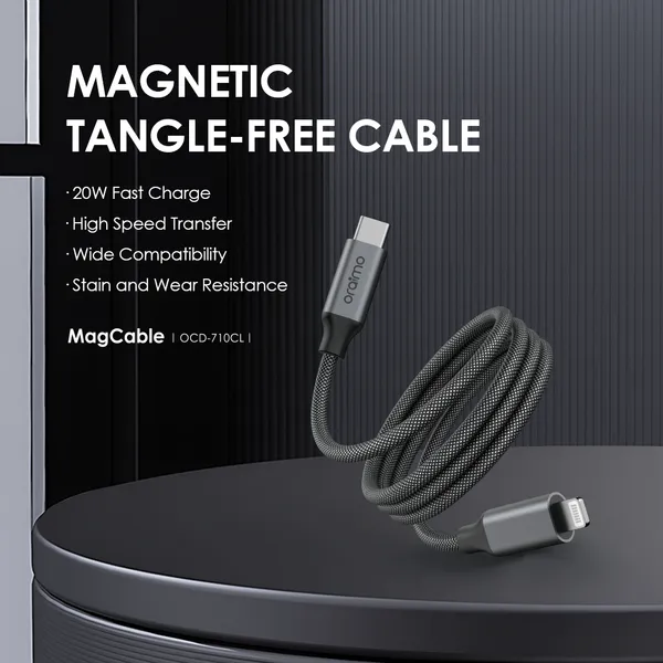 Promotional image of a magnetic, tangle-free MagCable with USB‑C and Lightning connectors, coiled on a dark pedestal, listing fast charge, high-speed transfer, wide compatibility, and wear resistance.