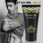 Promotional image for Titan Gel Gold showing a male model beside a tube of the gel with text 'Limited Edition', 'Serious Deal', 'Reliable Supplier'.”,