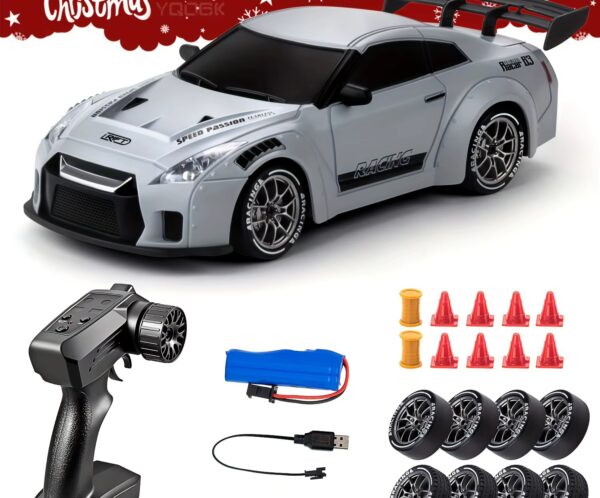 Remote-controlled toy race car with spoiler and racing decals, plus accessories like battery pack and charger fall out around it.