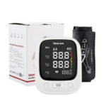White digital blood pressure monitor with cuff and its box, ready-to-use health device setup.