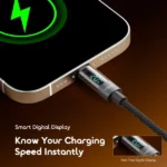 Smartphone plugged into a charger with a digital display showing charging speed, highlighting fast charging. Inset shows the real-time readout.
