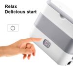 Person’s hand about to press a power button on a white appliance, conveying a 'start' action.